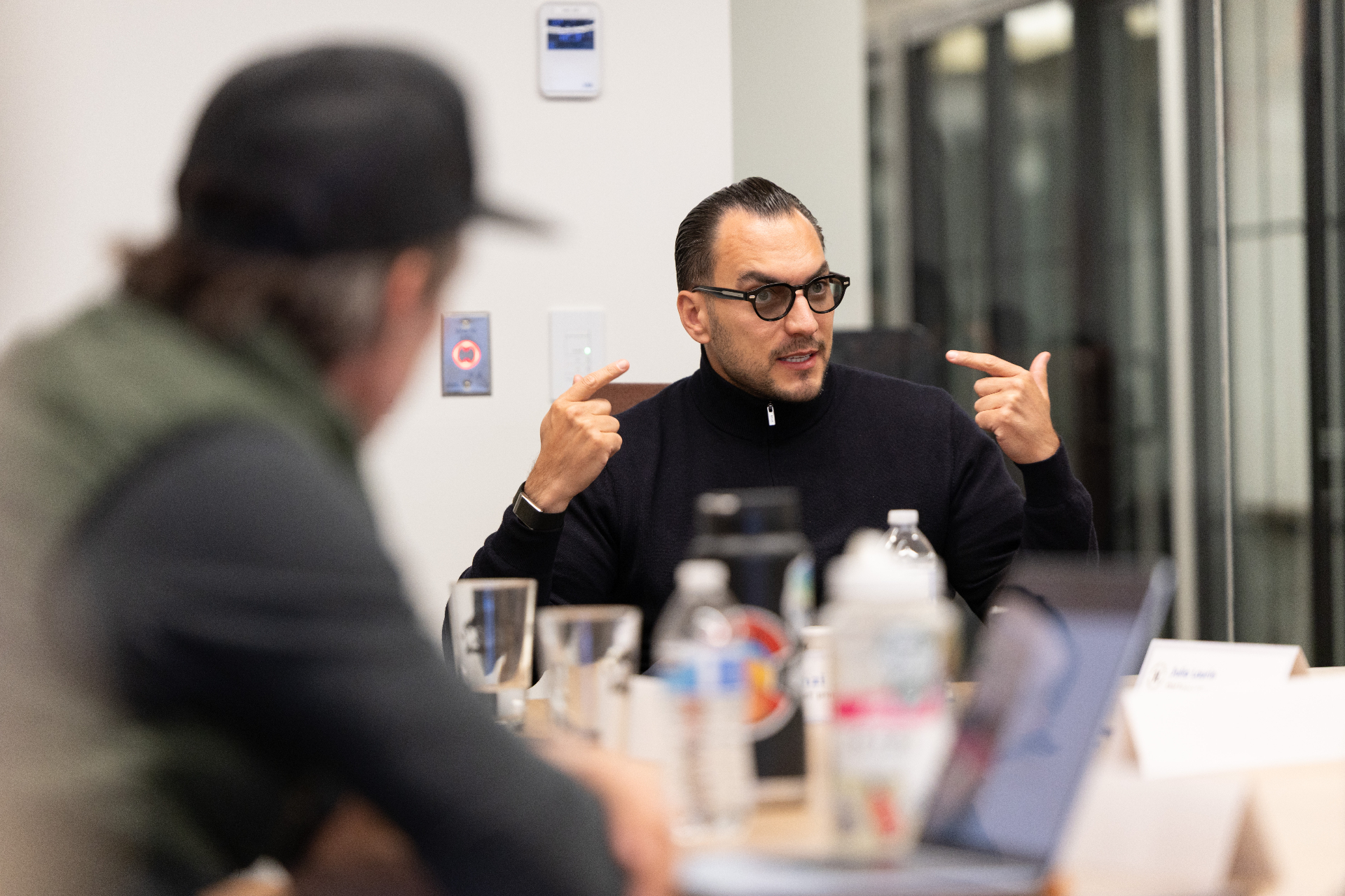 Levent Künzi in a meeting